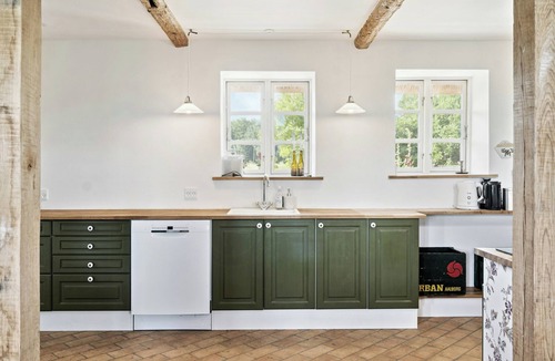 Majbolle House | Nostalgic charm in a yellow timber house