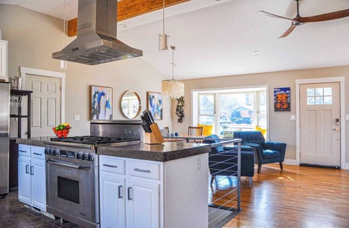 Martin Acres House | Our comfortable home, with great view of the Flatiron Mountains, sits in the heart of South Boulder. Enjoy the private hot tub spa, media room with 84" Theater TV, well stocked Chef's kitchen. Walk to shopping, restaurants, brewery and trails nearby.