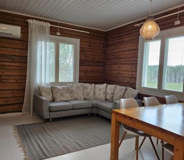 Muurame Apartment | Rauhallinen asunto maalla, navetan päädyssä.