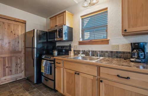 Dover Bay House | Relaxation is prescribed at "Doctor's Orders". This Dover Bay bungalow near Lake Pend Oreille offers a peaceful stay with resort amenities and cozy charm for total rejuvenation.