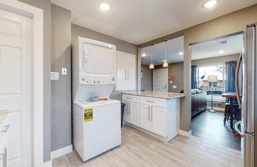 Twin Lakes House | Remodeled upper unit with 2 king beds in Denver