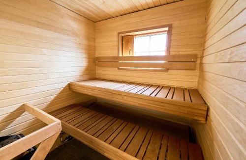 Rukatunturi Apartment | Rukan Havu - Ski-in cabin with sauna & fireplace, 100m to slopes