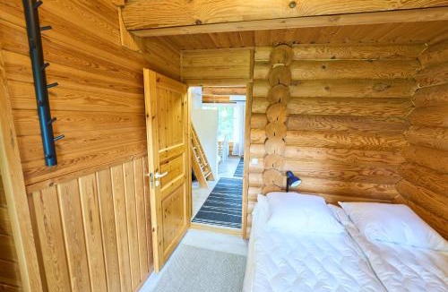 Rukatunturi Apartment | Rukan Varpu - Ski-in cabin with sauna & fireplace, 100m to slopes