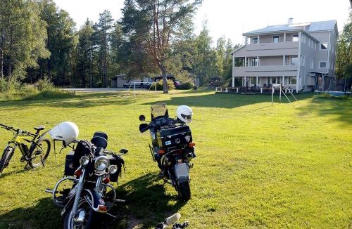 Luoto Hotel | Seitsemän sillan majatalo