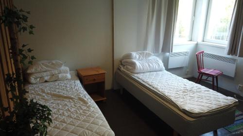 Luoto Hotel | Seitsemän sillan majatalo