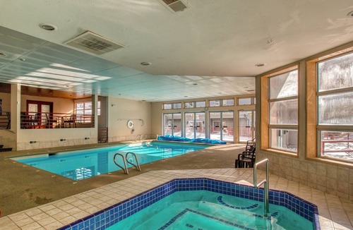 Mountain House Condo | Ski view condo with pool & hot tub, 2 fireplaces - walk to lifts