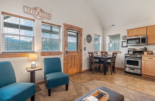 Dover Bay House | Slow down, just "Coast A While", and savor lakeside life at this perfect tranquil getaway.