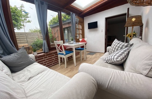 Westerland Apartment | Small apartment with winter garden and garden up to 3 persons - Nordlicht