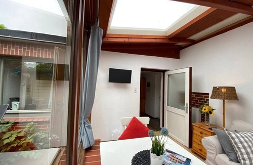 Westerland Apartment | Small apartment with winter garden and garden up to 3 persons - Nordlicht