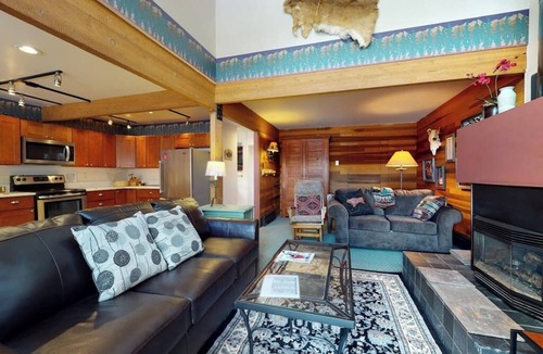 East Village at Copper House | Stylish townhouse with mountain and golf views, shared hot tub, and balconies