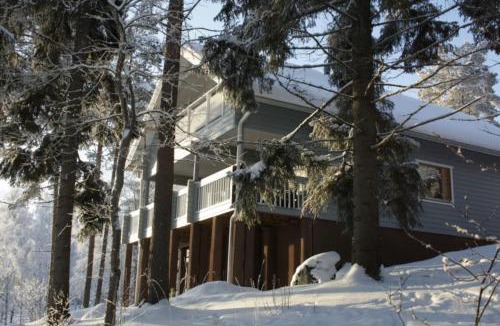 Tahkovuori Ski Chalet | Tahkon Riihiranta - 4 bedroom villa with lake view - Tilava mökki rantanäkymin