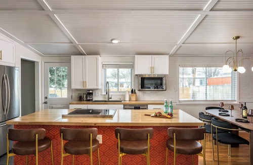 Westminster House | The Wild Western: 5 BR, Hot Tub, Sauna, 2 Game Rooms, Putting Green, & more!