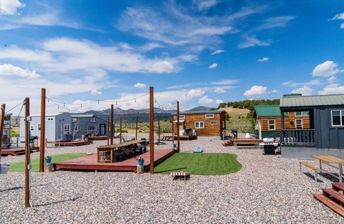 Meeker House | Tiny home with one queen bed and fold out couch all on main floor. Sleeps: 3