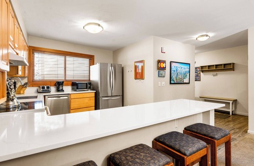 Four O'Clock Condo | Top Floor and Spacious, One block to Everything!