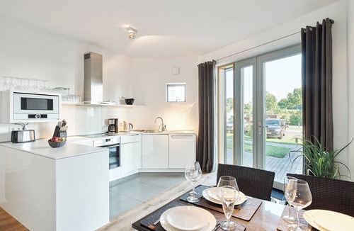 Ellenberg Apartment | Vacation apartment "Steuermann - ground floor and barrier-free" with a view of the harbor