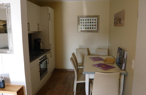 Neue Tiefe Apartment | Vacation home Aloha 1 on Fehmarn: Modern accommodation with terrace.