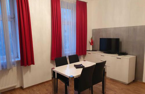 Erdberg Apartment | Vibrant Red Apartment I contactless Check-In