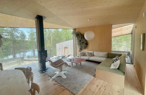Utajarvi Villa | Villa Jäkälä - An architectural wooden villa by the lake