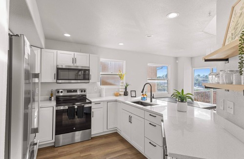 Pueblo West House | Warm 4BR Home with Hot Tub, Sunset Deck,Sleeps 10