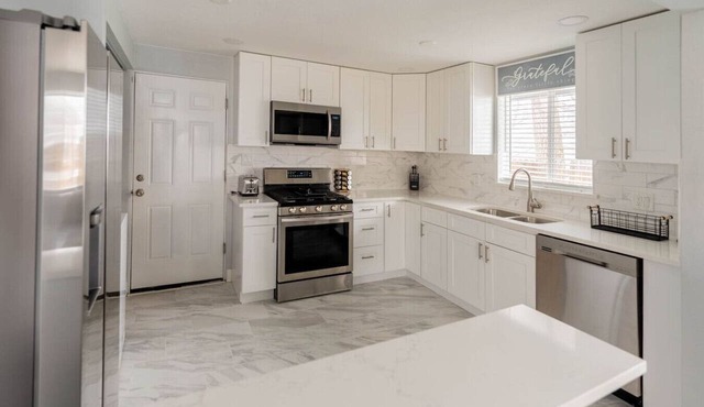 8673 W 63rd Pl · Golfers Dream! Sweet NW location.