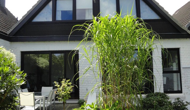 Beach and sea(h)r in a vacation home with garden close to the beach at Schilksee⛵️