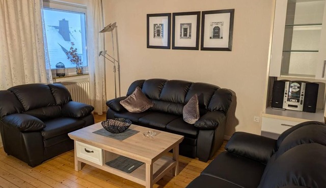 Bright apartment (81sqm) with wood-burning stove and balcony with view