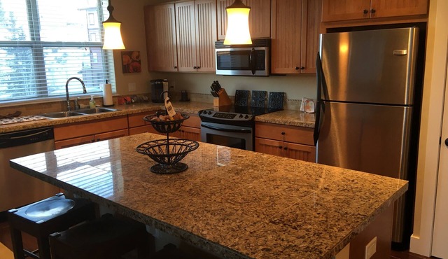 Cozy Base Camp corner unit condo with large deck and great views of the valley.