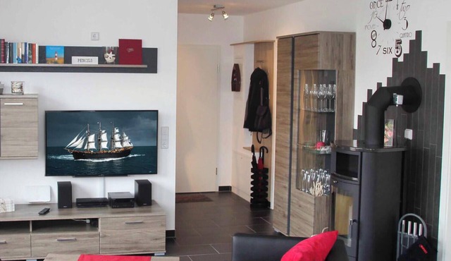 ECARF certified vacation apartment Meeresrauschen 12 in Großenbrode. Maximum living comfort with TV recliner, underfloor heating, rain shower & sauna. Modern entertainment electronics with Sony PS3