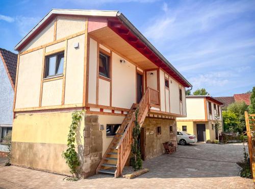 Ferienwohnung 'Ginkgo' mit verwunschenem Garten & privater Sauna