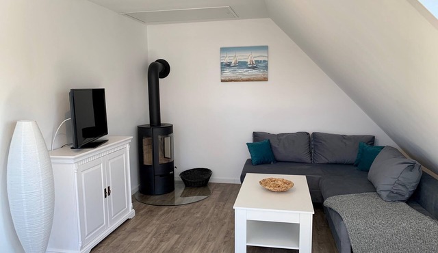 Goldblick apartment with wood-burning stove, garden and proximity to the sandy beach on Fehmarn