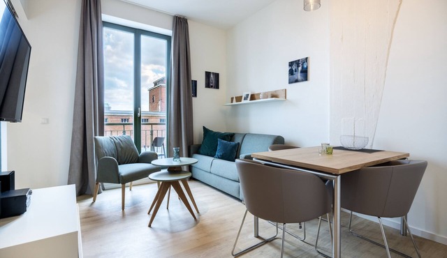 Hübsches Apartment mit Balkon, Hafenblick und Saunanutzung in Erstklassiger Lage