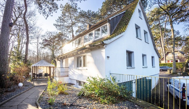 Holiday Home 'Sandstrand' with Private Terrace, Garden, and Wi-Fi
