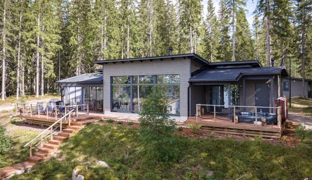 Holiday home with outdoor Jacuzzi and Sauna