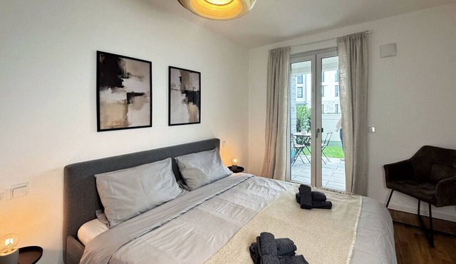 HolidayHome Apartments | Airport Deluxe Condo with Terrace