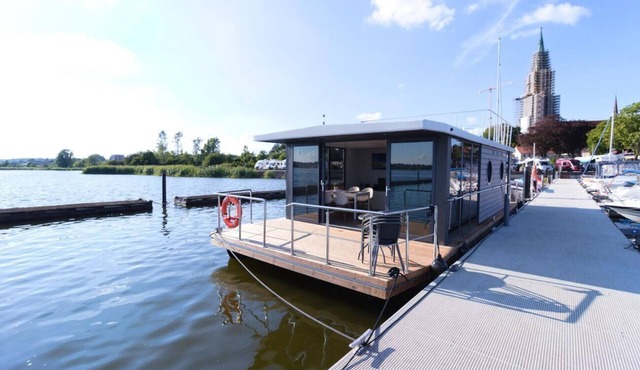 Houseboat Fjord Aries with roof terrace in Schleswig