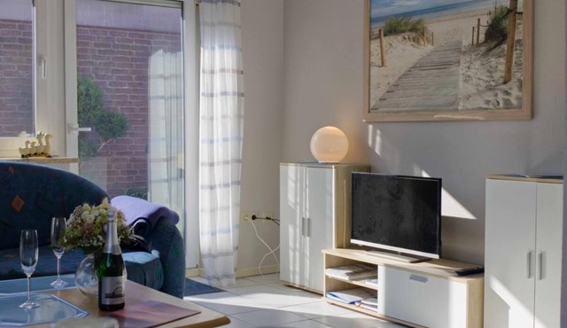 Inselblume 39 - Vacation apartment with washing machine in Burg