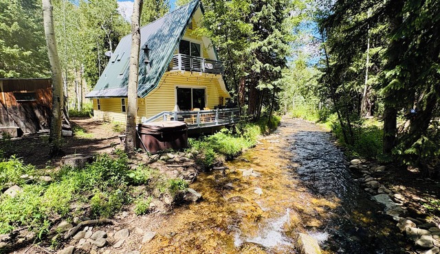 Lazy Me ~ A Magical Creek-front Cabin with Hot Tub & Private Woods
