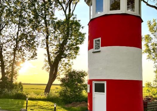 Liebevoll hinterm Deich - Ferienwohnungen