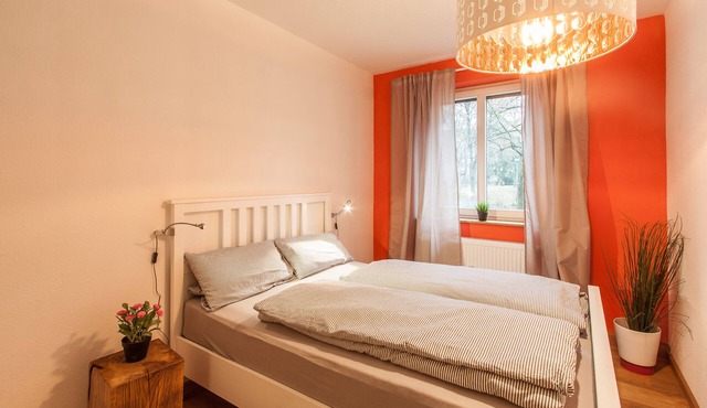 Living at the Ringpark - modern apartment on the banks of the Main with a view of the fortress/Käppele
