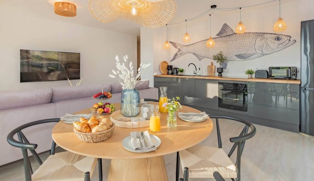 Modern apartment with balcony and parking space - only 800 m to the beach