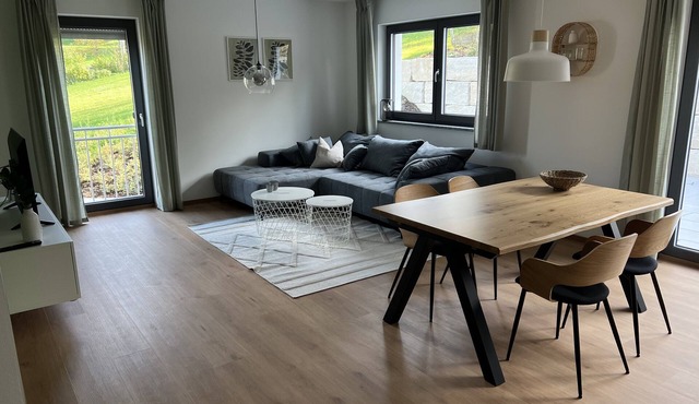 Modern apartment (75sqm) with balcony and terrace in idyllic surroundings