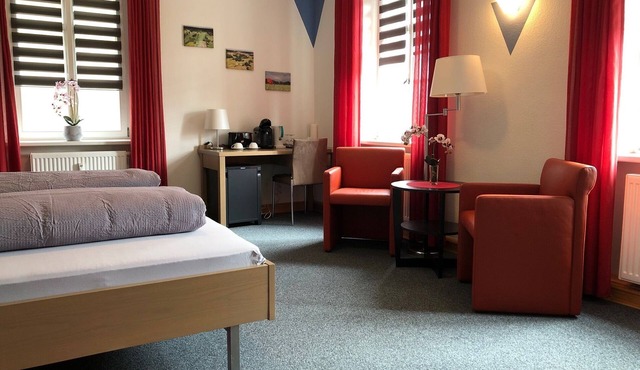 Modern double room in a quiet location with golf course view
