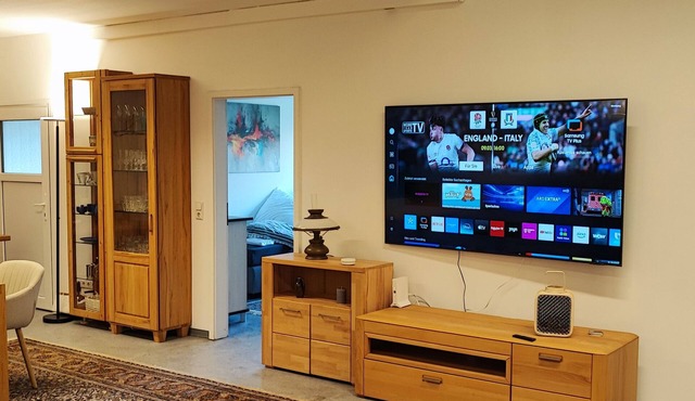 Modern loft apartment near Würzburg with WLAN parking lot Grill+ 75 inch TV