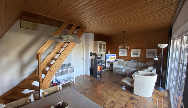 Roof house with 70m² on two levels with a garden, 150m to the dike