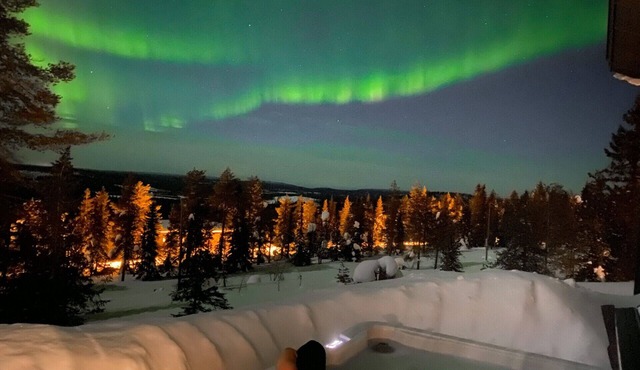 Ski-in Log Villa with Stunning Jacuzzi Views at Syöte