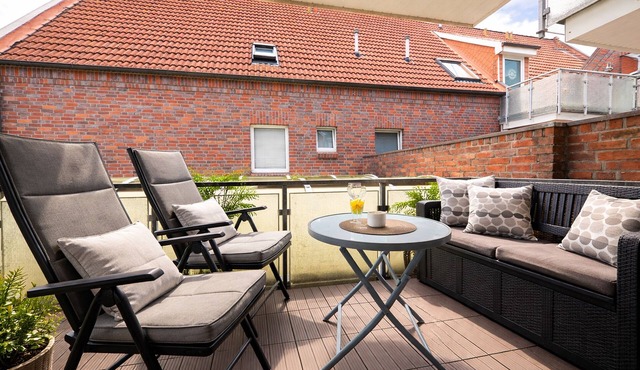 Smutje apartment near the beach with balcony, WLAN and parking space