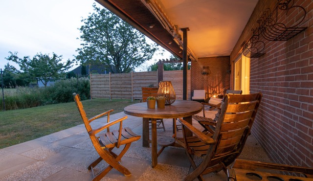 Spacious vacation apartment with garden, surrounded by greenery.