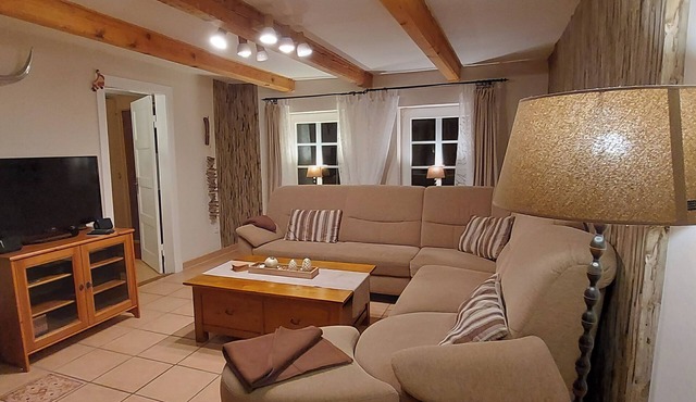 Stylish 100m² accommodation with fireplace, terrace and three bedrooms