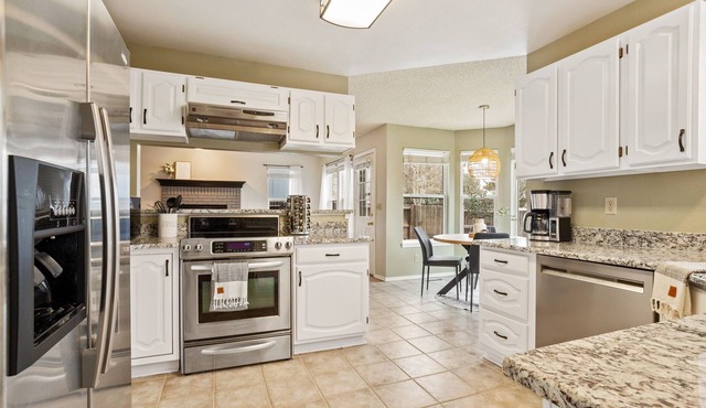 Stylish 5-Bedroom Retreat in Briargate – Family-Friendly with Spacious Backyard!
