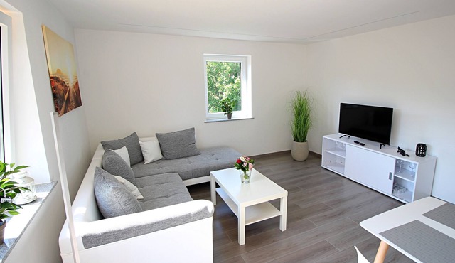 Top apartment in a quiet location, yet central